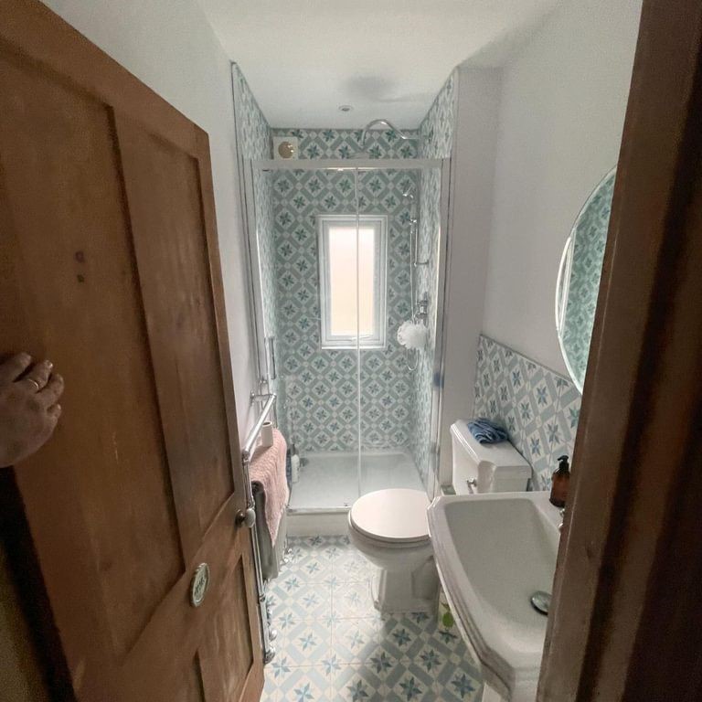 Narrow bathroom blue