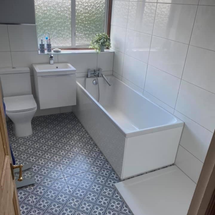 bathroom with shower tray
